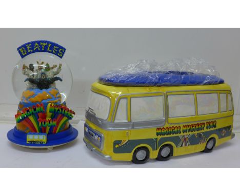 The Beatles Magical Mystery Tour Musical Globe and a similar Collector's Edition Tour Bus cookie jar, by Vandor, both boxed