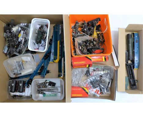 An assortment of Tri-ang, Tri-ang-Hornby and Hornby 00 gauge model railway spares including chassis, motor badges, coach ligh