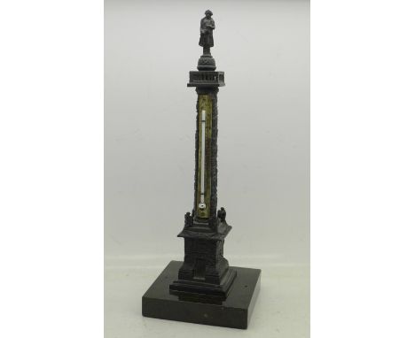 A cast metal model of Nelson's column with thermometer