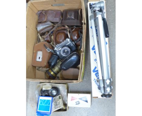 A collection of cameras, Yashica, Ilford, Kodak, a Benjamin light meter, Leica film copier, lenses, etc., and a Velbon tripod