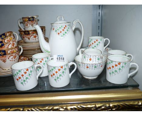 A six piece Foley coffee set including Coffee pot, sugar bowl & creamer, six coffee cans and saucers, white with gilt edging 