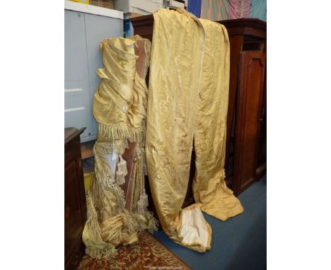 A pair of pale yellow brocade interlined Curtains plus two pelmets with swags, each to fit a 6' wide window, curtains 84" wid
