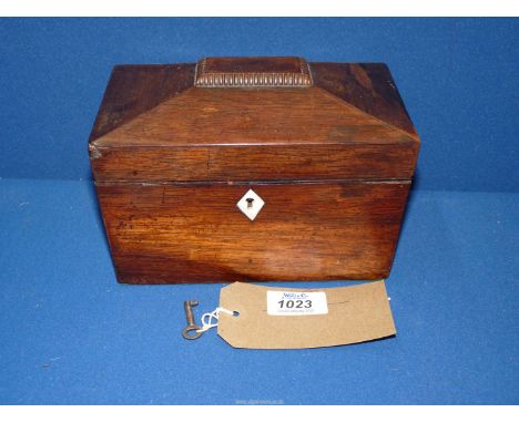 An early 19th century Rosewood sarcophagus Tea Caddy, 7 1/2" wide x 5 1/2" high x 4 1/4" deep, with key.