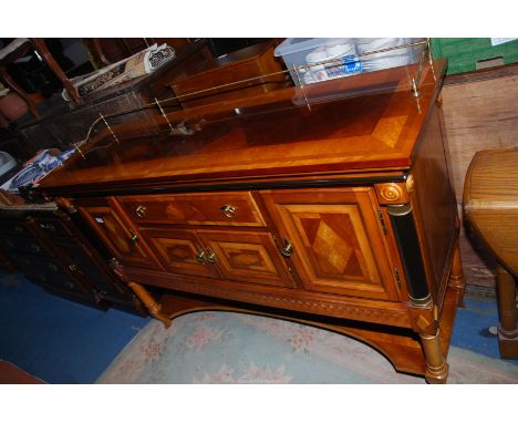 A Universal Furniture high gloss finish mixed woods sideboard with herringbone cross-banding and burrwood inlays and having a