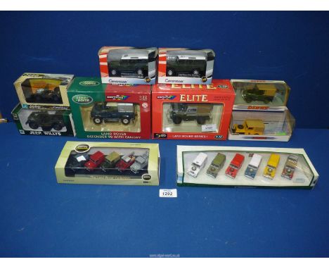 A quantity of boxed model Land Rovers and Jeeps to include: two Britains 1:32 scale Land Rovers, Dinky, Oxford models, etc.