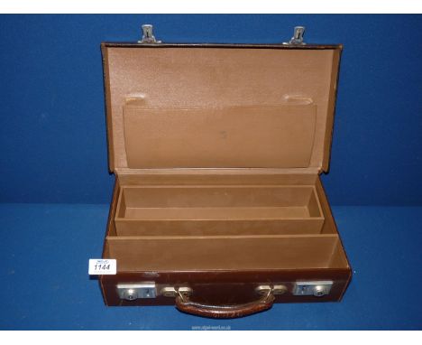 A leather briefcase with stationery inserts.