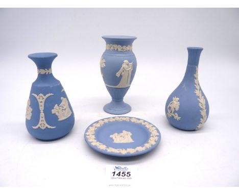Four pieces of Wedgwood blue Jasperware, bud vases and trinket dish.