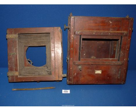 Two wooden camera components to include: one by W. Watson & Sons.