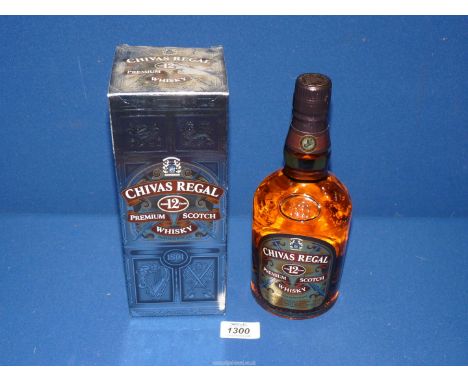 A presentation boxed bottle of Chivas Regal Scotch Whisky, a 12 year old blend of the finest aged Speyside malts.