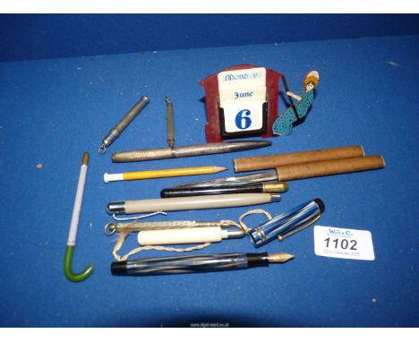 A small quantity of pencils and pens to include hallmarked silver pen, Parker fountain pen, propelling pencil in the form of 