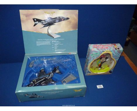 A boxed Corgi Harrier (scale 1:72) and a vintage Mickey Mouse clock, both in original boxes.