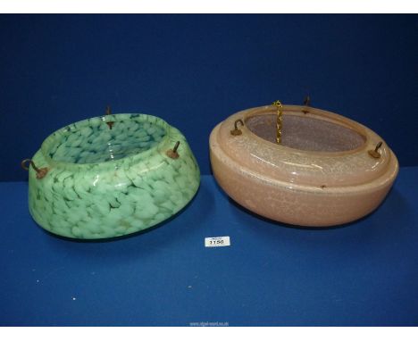 Two 1950's glass lighting bowls, one pink, one green.
