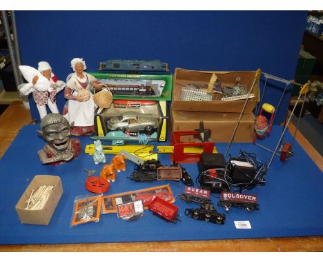 A quantity of toys to include: tinplate gymnast (as found), a boxed Algoma central loco, a boxed Burago Porsche 356 B coupe, 