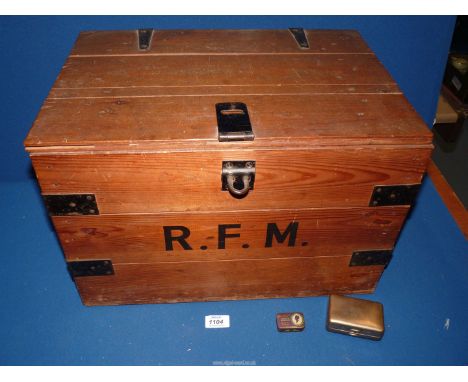 A wooden Travel Trunk with metal fittings and marked R.F.M to the front, 19" wide x 13" depth x 12 1/2" tall.