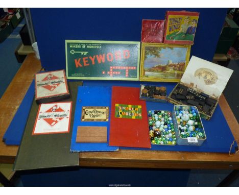 A quantity of vintage games to include: boxed Waddingtons jigsaw puzzle, marbles, Monopoly, etc.