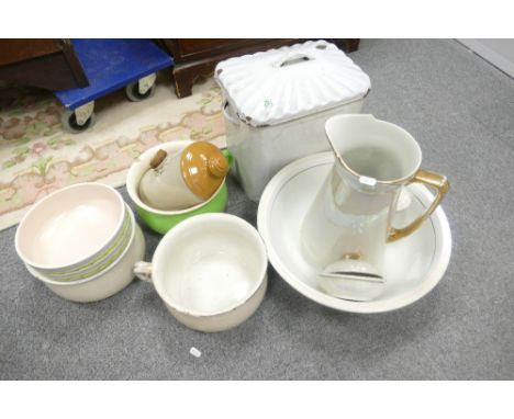 A mixed collection of items to include large pottery wash basin and jug, Poole Pottery fruit bowl, enameled bread bin etc (10