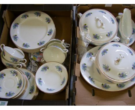A collection of English Fine China dinner & tea ware decorated with blue chintz flowers including tureen & covers, soup cups 