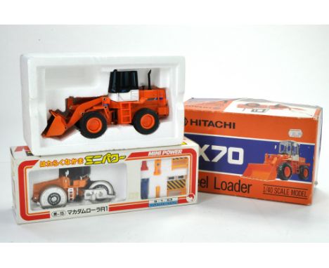 Japanese duo of construction issues, Hitachi and Roleau. Appear excellent in boxes. 