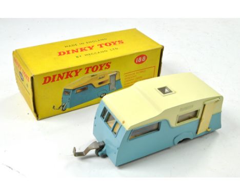 Dinky No. 188 Four Berth Caravan. Two tone cream, light blue with chrome spun hubs. Generally very good to excellent, the odd