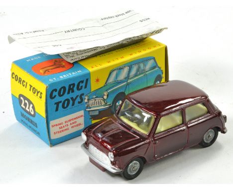 Mini Collection comprising Corgi Toys No. 226 Morris Mini Minor. Maroon with lemon interior. Excellent, no obvious signs of w