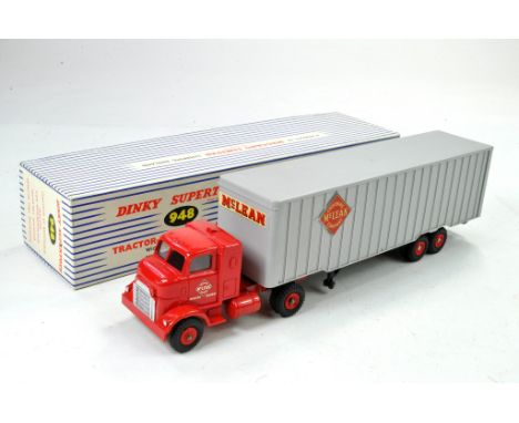 Dinky No. 948 Tractor-Trailer McLean. Red cab and plastic hubs, fawn Trailer&nbsp;with McLean decals. Excellent, little or no