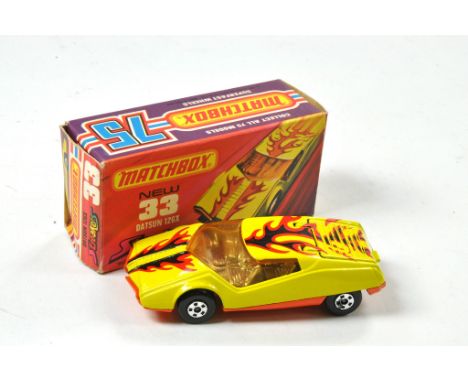 Matchbox Superfast No. 33B Datsun 126X. Yellow body, orange base with amber glass and red/black flame prints (Streakers issue