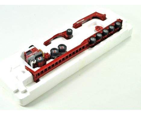 Corgi Diecast Model Truck issue comprising Heavy Haulage Volvo FH16 Low Loader in the livery of Bennett. Appears fair with so