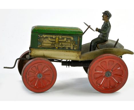 Guntherman scarce clockwork tinplate vintage tractor, litho printed with seperate tin figure. Working example is good, some s
