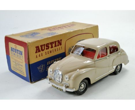 Victory Models / Industries Battery Operated 1/18 Plastic Austin A40 Somerset in fawn. Appears clean hence generally excellen