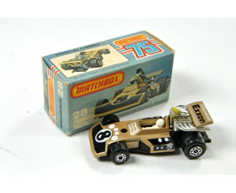 Matchbox Superfast No. 28D Formula Racing Car. Metallic Gold body, black base, white driver. 'Exxon' and '8' prints. Appears 