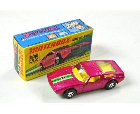 Matchbox Superfast No. 32B Maserati Bora. Metallic magenta body, green base. Yellow interior, stripe and '8' label. Appears e