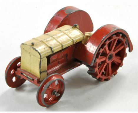 Dinky Pre-war 22 Series Tractor in red and cream, signs of wear but still hard to find in any condition. 