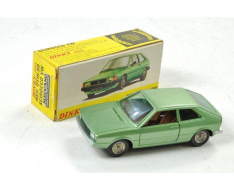 Dinky No. 011539 VW Scirocco. Made in Spain. Metallic light green with brown interior. Excellent. Factory marks only in very 