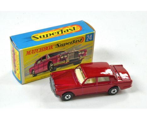 Matchbox Superfast No. 24C Roll-Royce Silver Shadow. Dark metallic red body, off-white interior with pink base. Appears excel