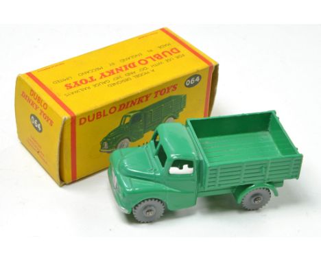 Dinky Dublo No. 064 Austin Lorry in green. Excellent in excellent box. 