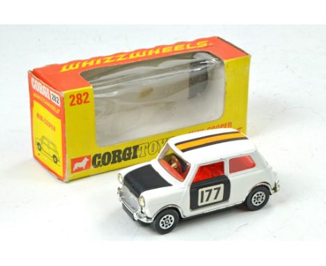 Corgi Whizzwheels No. 282 Mini Cooper. White  / Black with Red Interior. Orange / Black Roof Stripes, No. 177 Decal. Generall