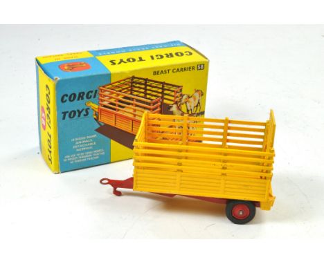 Corgi No. 58 Beast Carrier. Yellow, Red with plastic wheels. Missing animals. Generally very good, a few specks of wear in ve