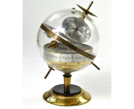 Pedestal globe shaped brass and plastic barometer, hygrometer and thermometer. Unusual piece looks to be very good. 