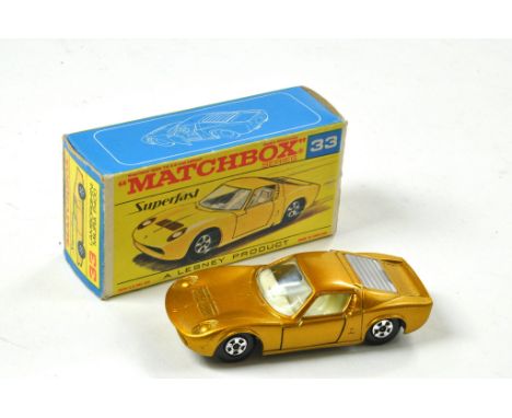 Matchbox Superfast No. 33A Lamborghini Miura. Dark metallic gold body, white interior, unpainted base and narrow wheels. Appe