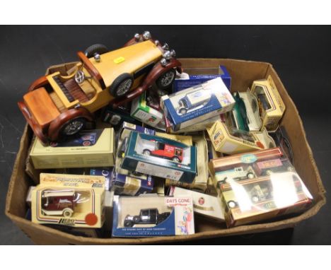 A COLLECTION OF FORTY FIVE BOXED DIECAST VEHICLES BY CORGI, LLEDO DAYS GONE, MATCHBOX MODELS OF YESTERYEAR, together with a w