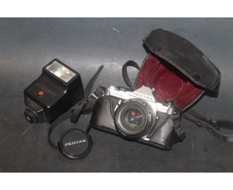 AN ASAHI PENTAX ME SUPER 35 MM CAMERA, together with a Pentax-A 50 mm lens, Pentax case and Pentax AF 200S Electronic Flash