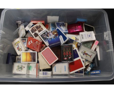A LARGE QUANTITY OF VARIOUS SETS OF PLAYING CARDS, many unopened 