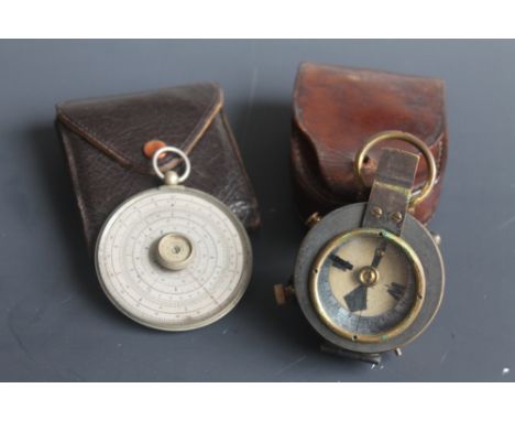 A BRASS MILITARY TYPE MARCHING COMPASS, together with a Halden calculex in pouch (2)