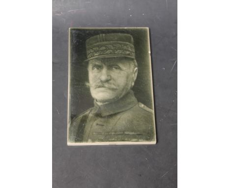 "GENERAL FOCH" PORTRAIT TILE BY J. BARRATT &amp; CO, in a dark grey-green glaze. 22.5cm x 15cm
Condition Report: Some edge ch