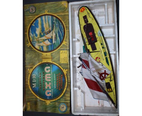 A vintage 1:10 scale Russian made model boat. Plastic construction, within the original box. 