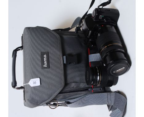 An original Canon EOS 1000F N SLR 35mm camera, complete with 2x lenses - 75-300mm and 35-80mm. ALong with a kit bag and origi