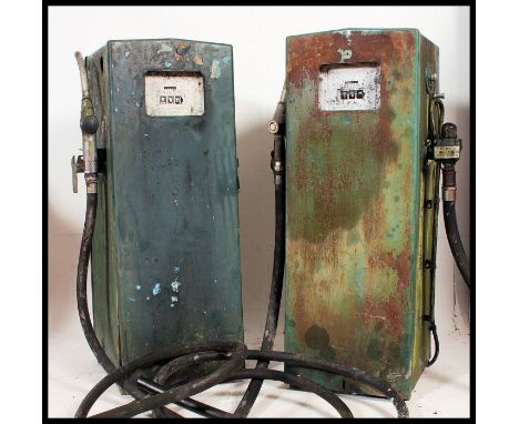 GILBARCO PETROL PUMPS: A pair of vintage original garage forecourt Gilbarco petrol pumps. Each with a manual dial ' Gallons '