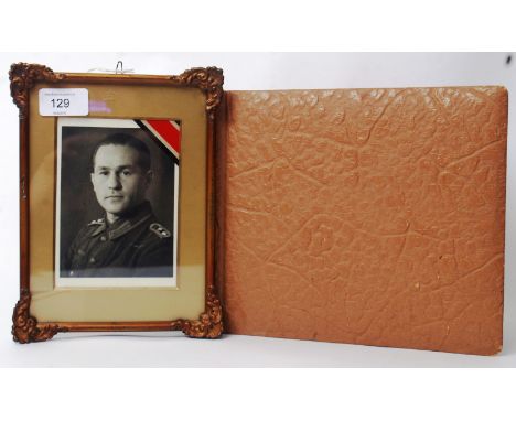 An original WWII era Nazi army related photograph album, filled with various photographs of soldiers, regiments and locations