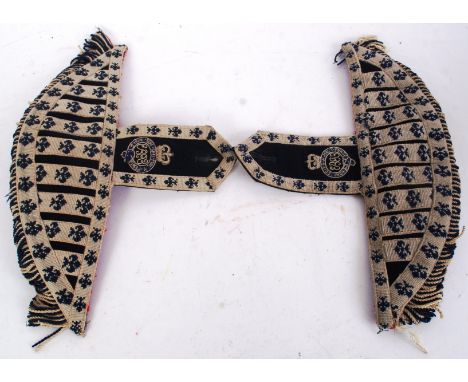 EPAULETTES: A pair of vintage original Bandsman soldiers uniform epaulettes. Each highly decorative with motifs and tassels. 
