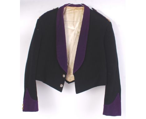 MESS TUNIC: A vintage military issue soldier's mess tunic jacket. With purple sleeves, and epaulettes to shoulders. 